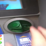 Gif of a card skimmer in use