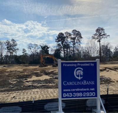 Carolina Bank sign in front of a construction site.  