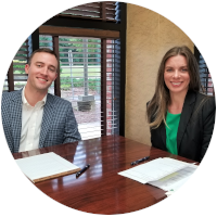 Members of the business services team at a meeting table.