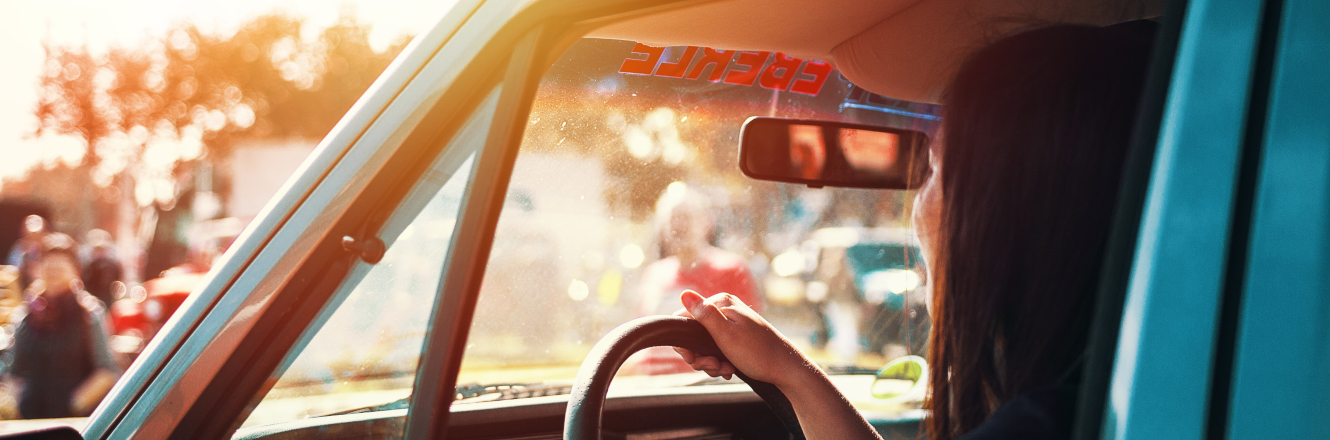 Blue Truck with Woman Driving