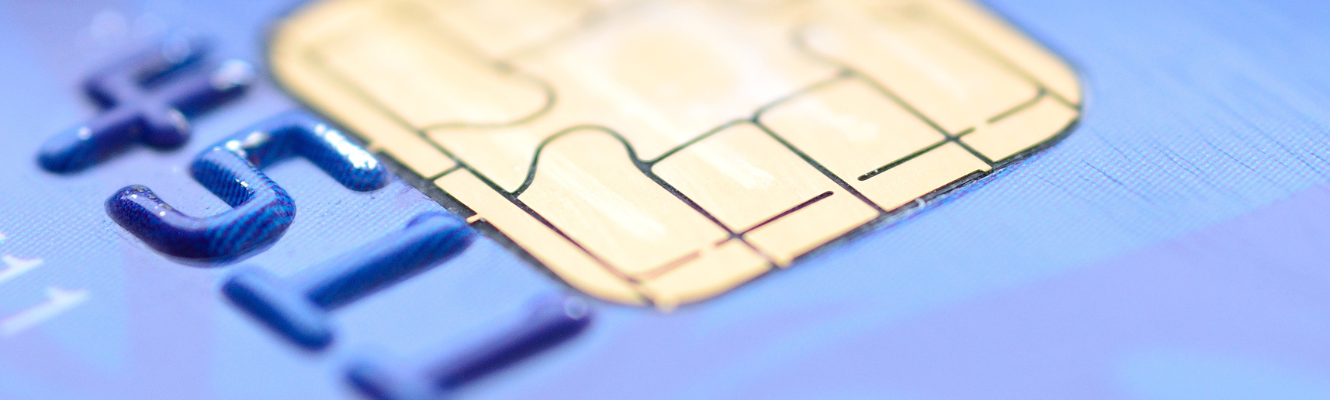 Close up picture of a blue debit card. 